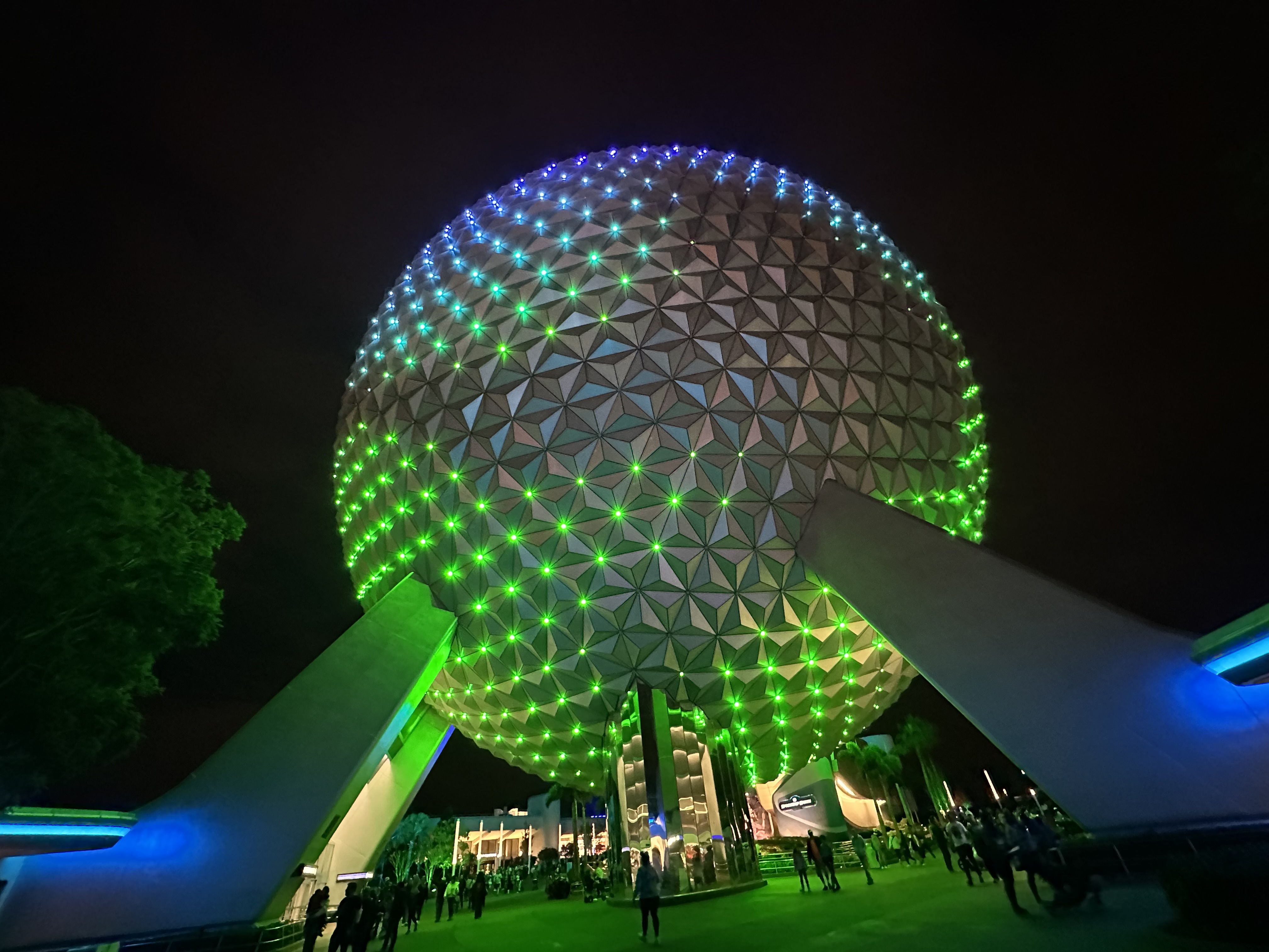 Epcot ball lit in green